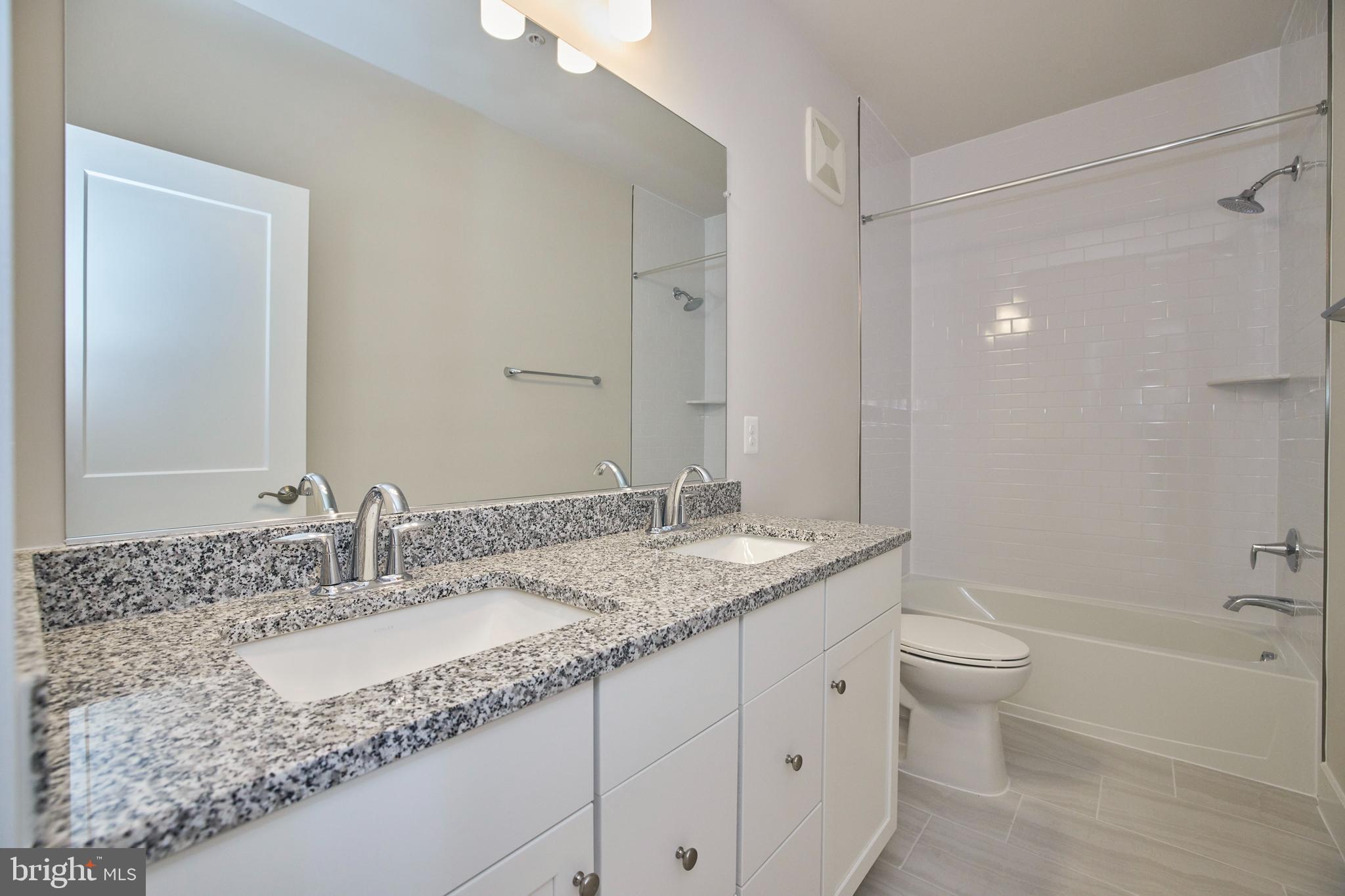 1682 Bandit Loop, Unit 14B Reston, VA 20190 - Photo 14 of 20 Hall bath