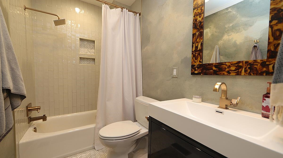 809 Young Street Raleigh, NC 27608 - Photo 19 of 35 New new new....New tile, new ceiling, new wallpaper, New mirror. exquisite Bathroom