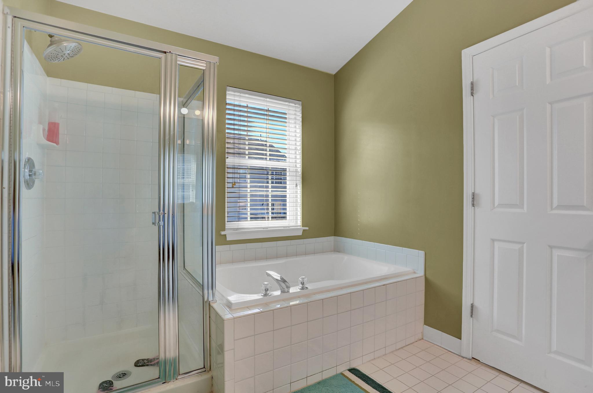 4712 Ashforth Way Owings Mills, MD 21117 - Photo 17 of 38 Primary Bathroom with Soaking Tub/Sep Shower