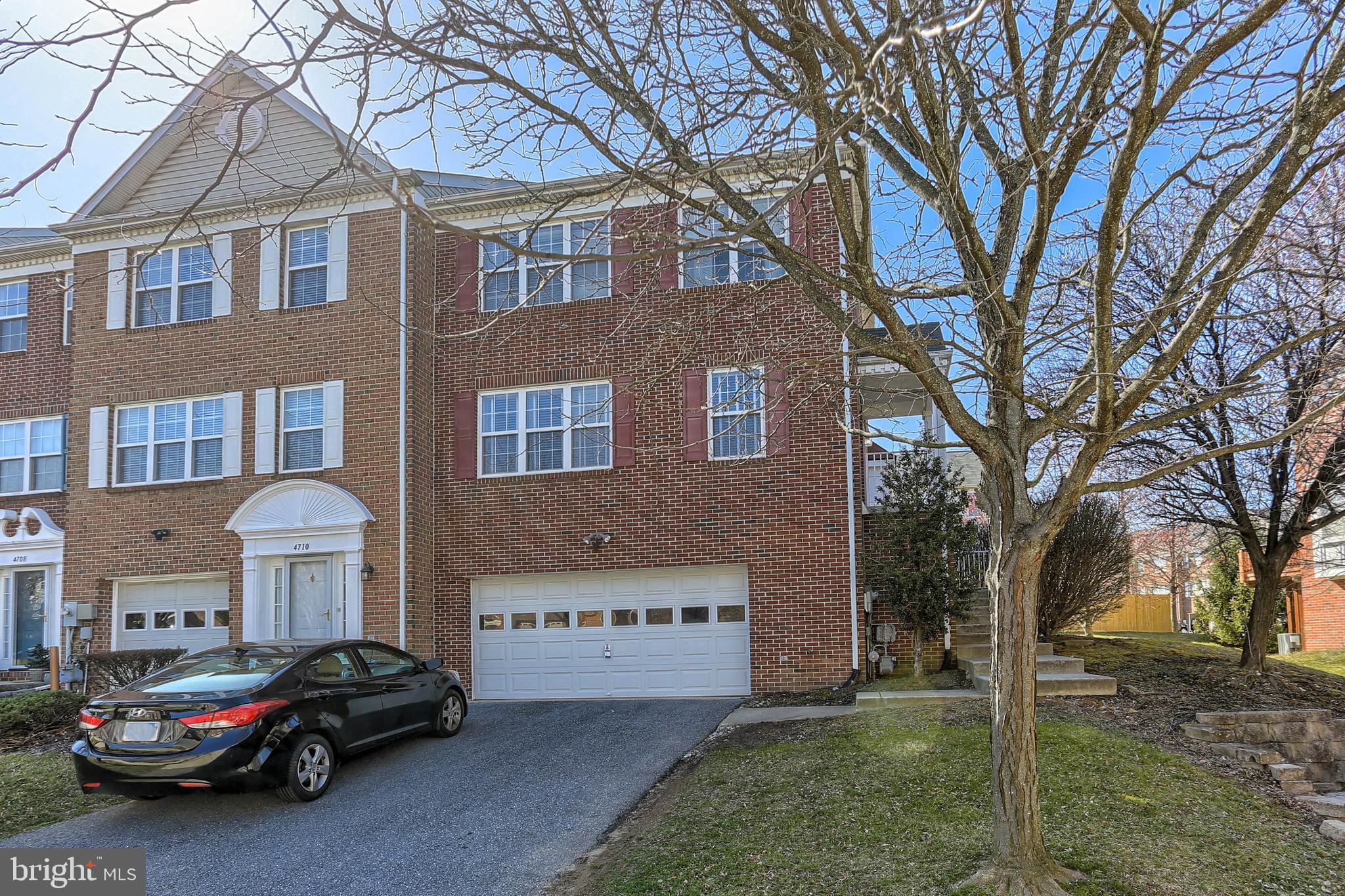 4712 Ashforth Way Owings Mills, MD 21117 - Photo 2 of 38 End of Group 2-car Garage. Brick Front.