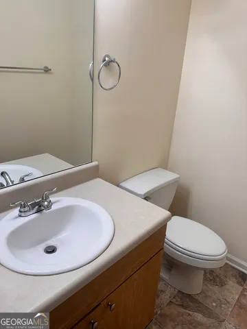 a bathroom with a sink and a toilet