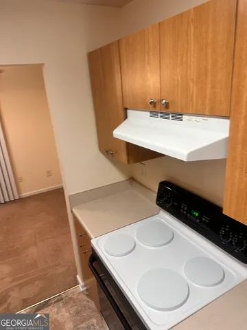 a close view of sink and washing machine