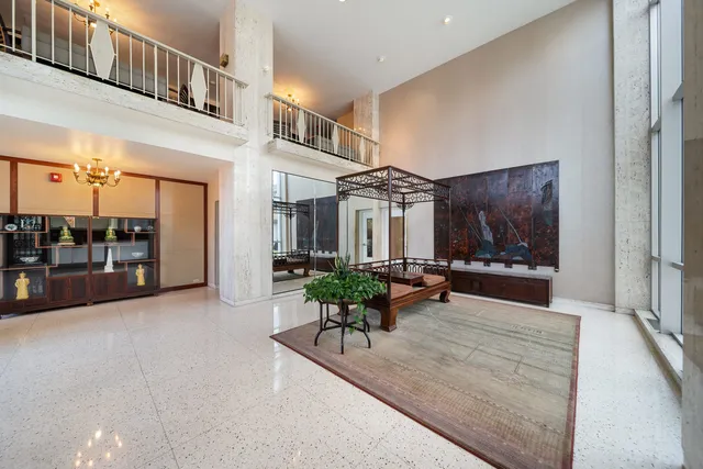 a view of a living room and entry way