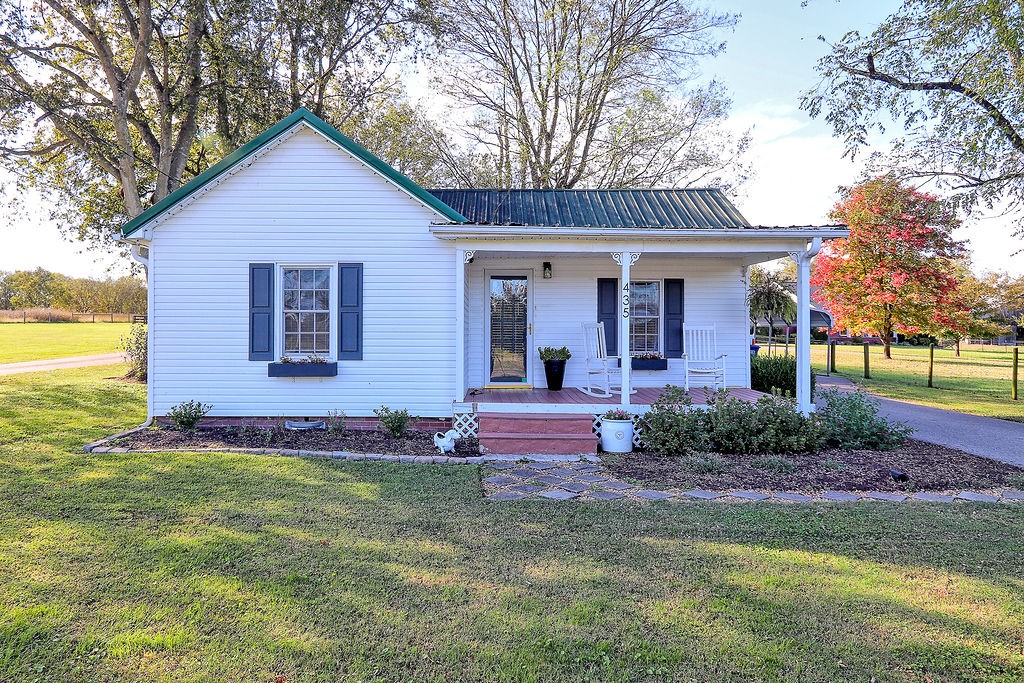 435 Canaan Road Columbia, TN 38401 - Photo 1 of 27 a view of a house with a yard patio and swimming pool