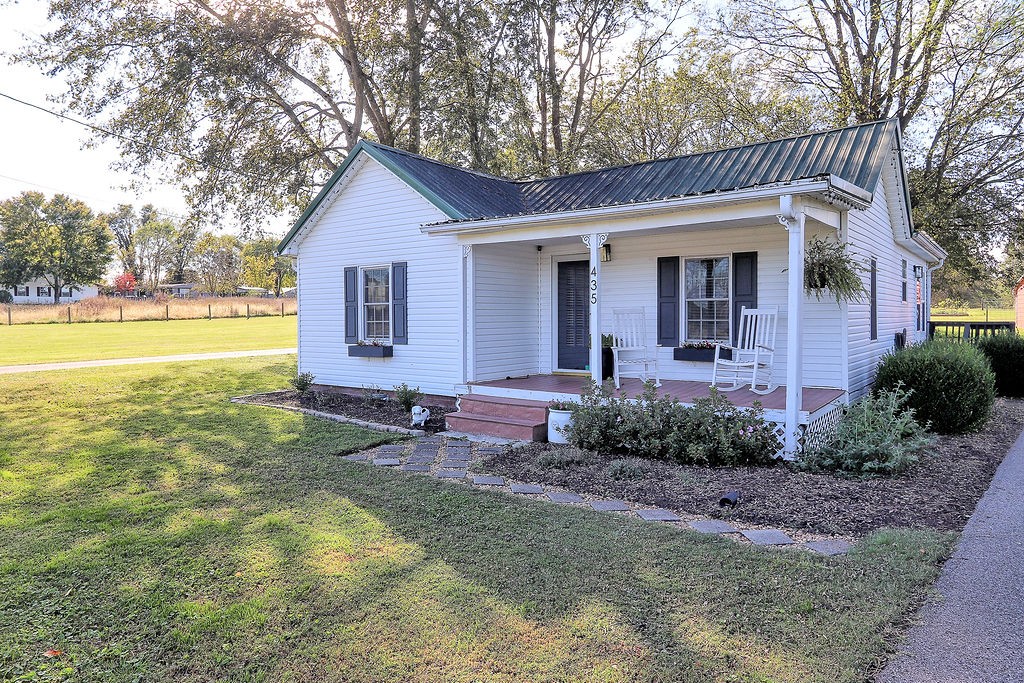 435 Canaan Road Columbia, TN 38401 - Photo 2 of 27 a view of a house with a yard and large tree