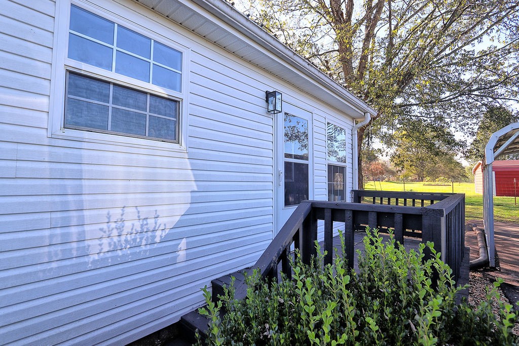 435 Canaan Road Columbia, TN 38401 - Photo 24 of 27 a view of a house with a yard and potted plants