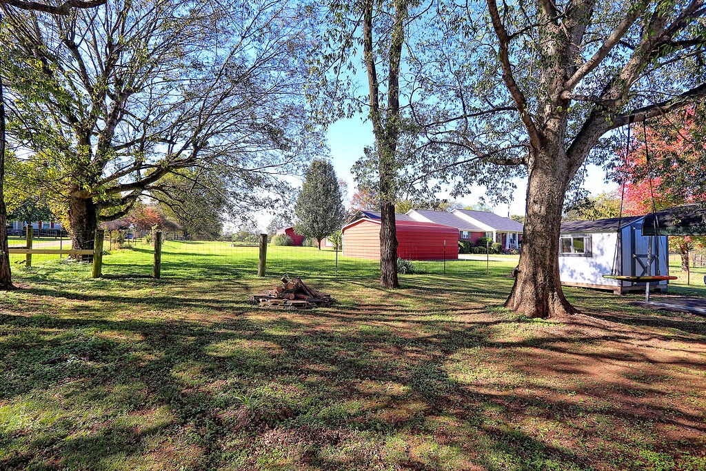 435 Canaan Road Columbia, TN 38401 - Photo 25 of 27 a view of a house with a yard