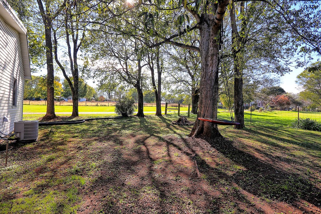 435 Canaan Road Columbia, TN 38401 - Photo 26 of 27 a view of a yard with trees
