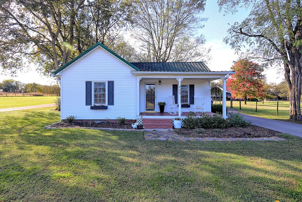 435 Canaan Road Columbia, TN 38401 - Photo 27 of 27 a front view of a house with a yard