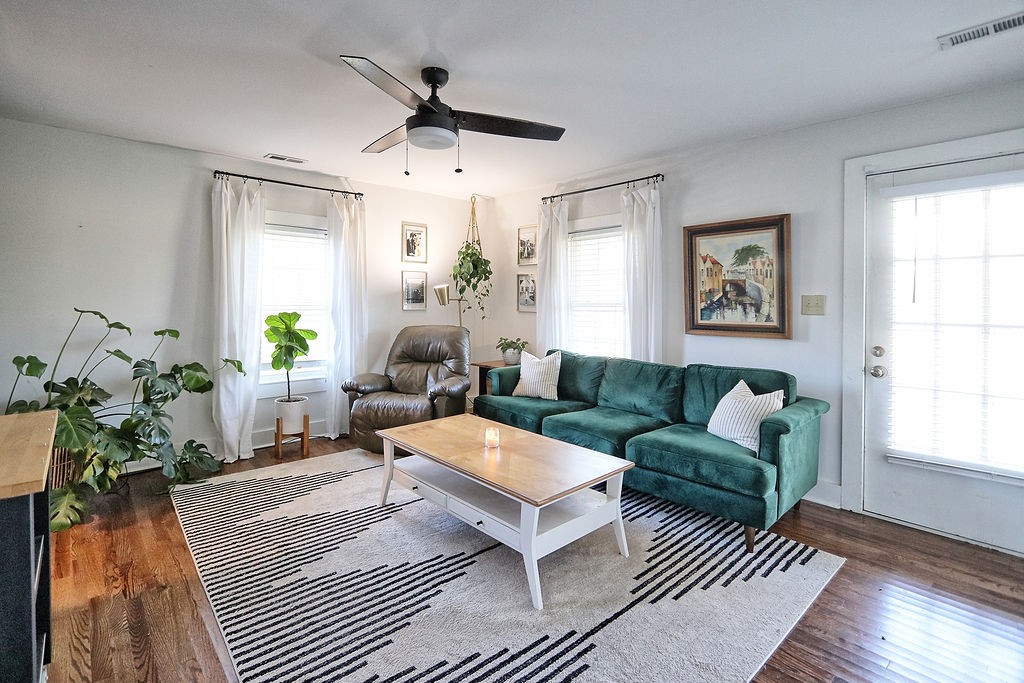 435 Canaan Road Columbia, TN 38401 - Photo 6 of 27 a living room with furniture a chandelier and a window