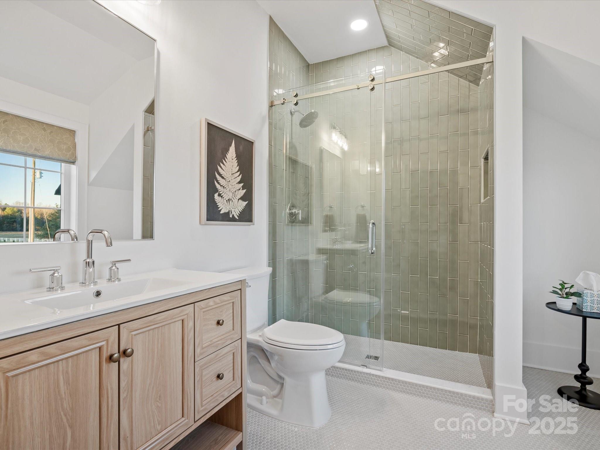 2370 Bridgewater Road Rock Hill, SC 29730 - Photo 37 of 47 a bathroom with a double vanity sink toilet and shower