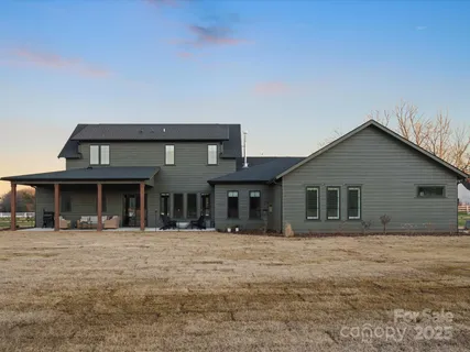 a front view of a house with a outdoor space