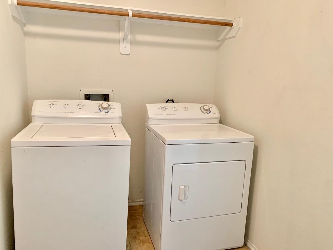 2902 Beacon Grove Street Spring, TX 77389 - Photo 11 of 22 a utility room with dryer and washer