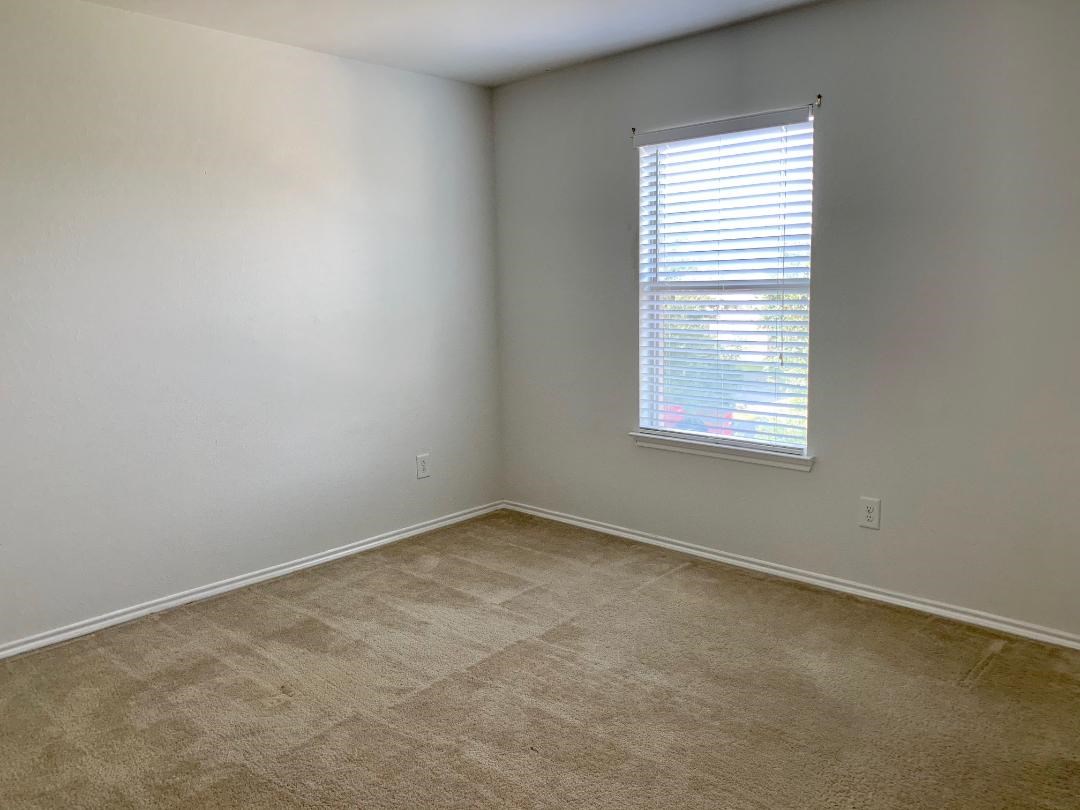 2902 Beacon Grove Street Spring, TX 77389 - Photo 13 of 22 an empty room with a window