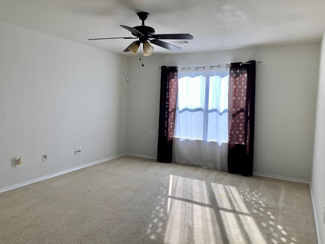 2902 Beacon Grove Street Spring, TX 77389 - Photo 14 of 22 a view of an empty room with a window