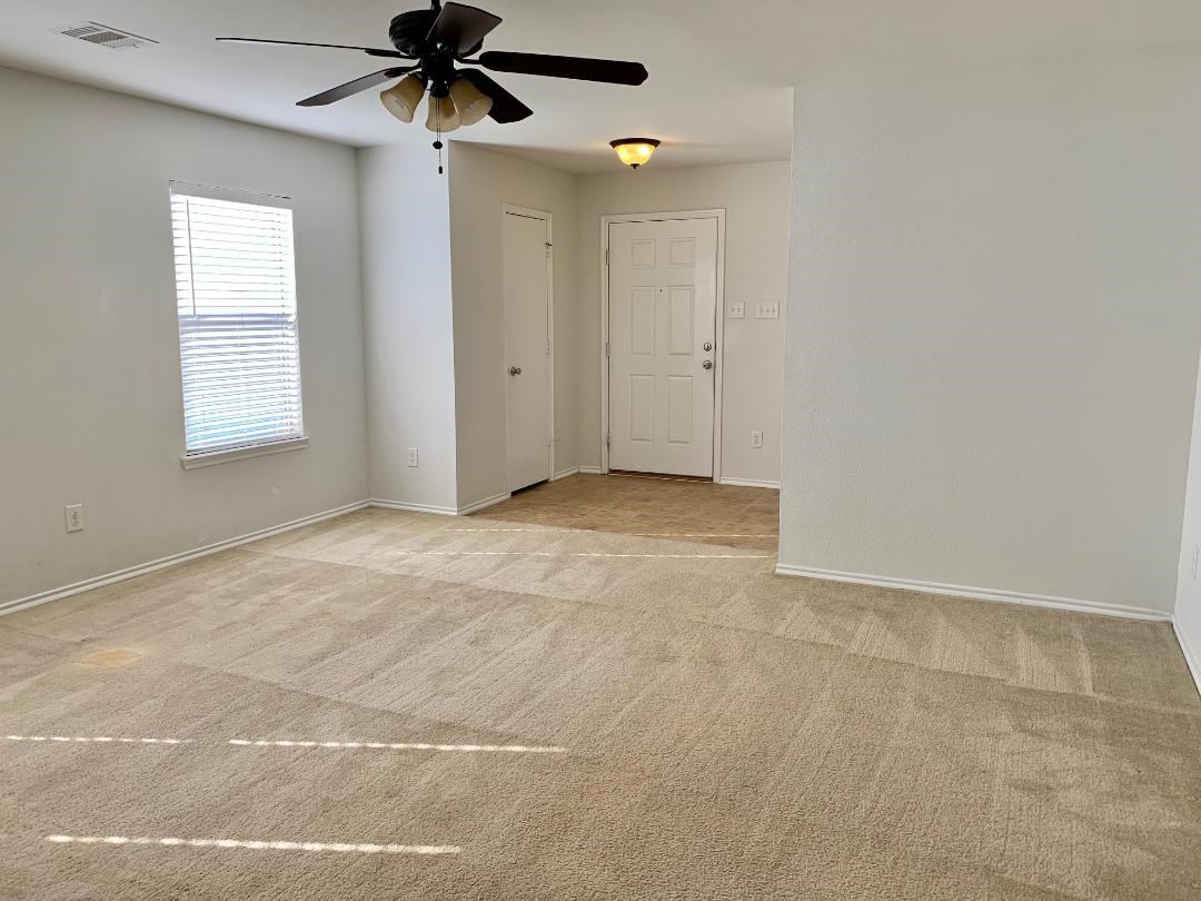 2902 Beacon Grove Street Spring, TX 77389 - Photo 18 of 22 an empty room with windows and fan