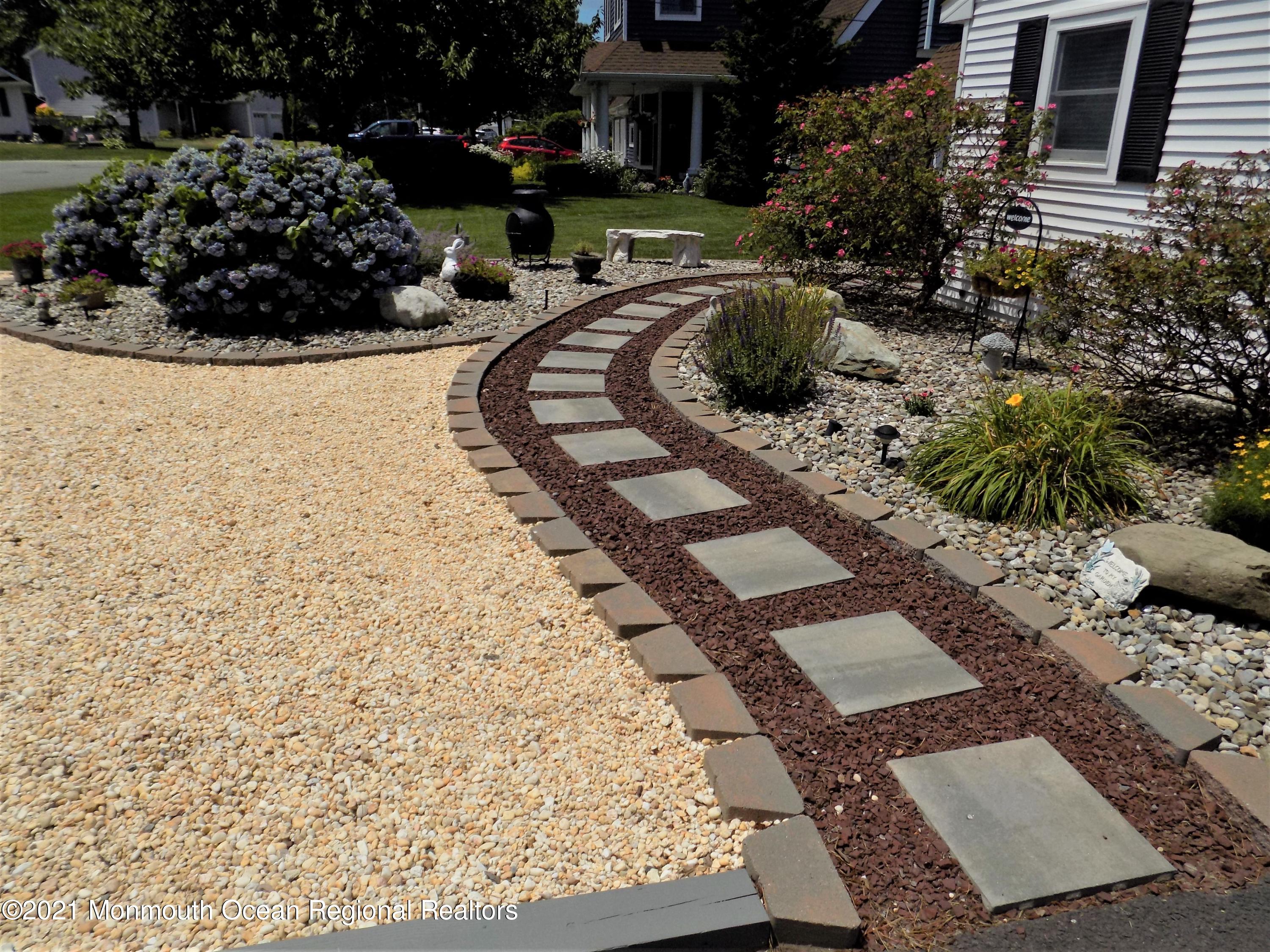 644 Harbor Road Brick, NJ 08724 - Photo 22 of 38 a garden view with a seating space