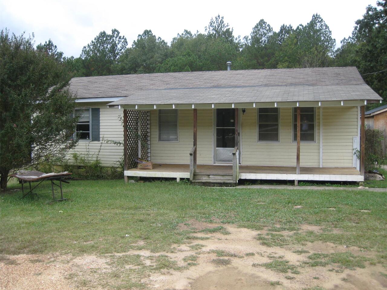 a view of a house with a garden