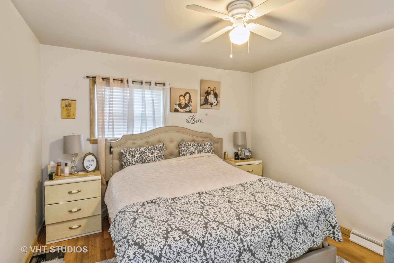 8517 West Foster Avenue Chicago, IL 60656 - Photo 8 of 21 a bedroom with a bed and a chandelier