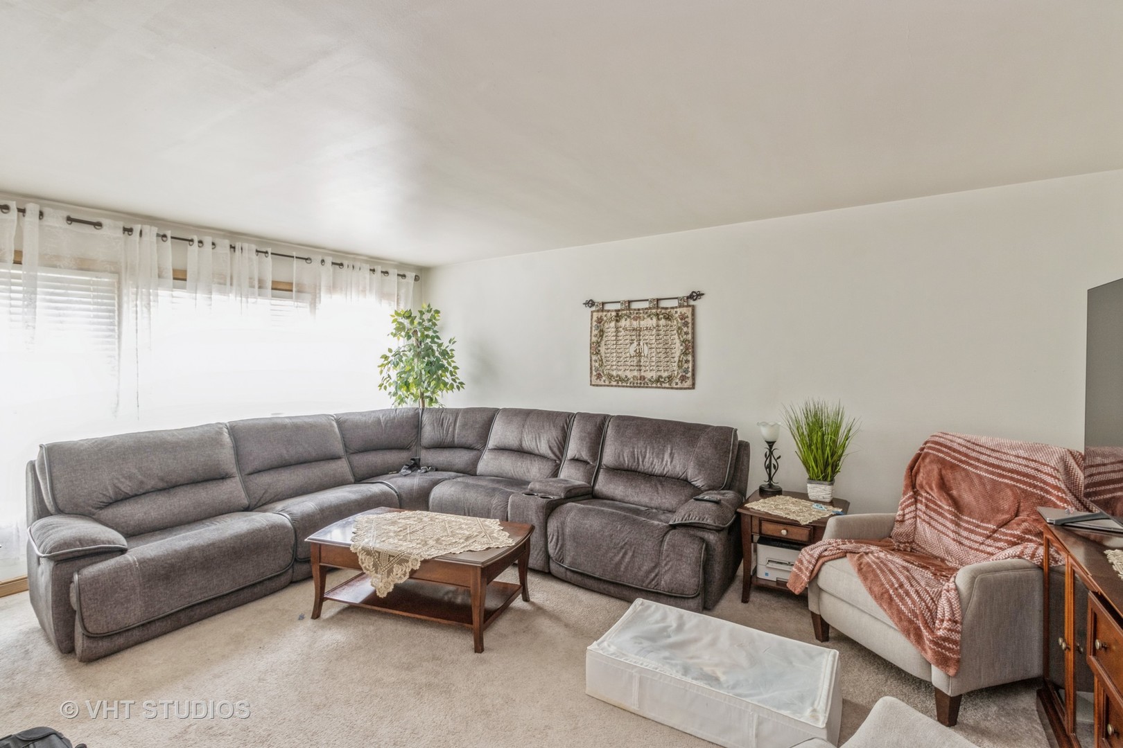8517 West Foster Avenue Chicago, IL 60656 - Photo 9 of 21 a living room with furniture and a large window