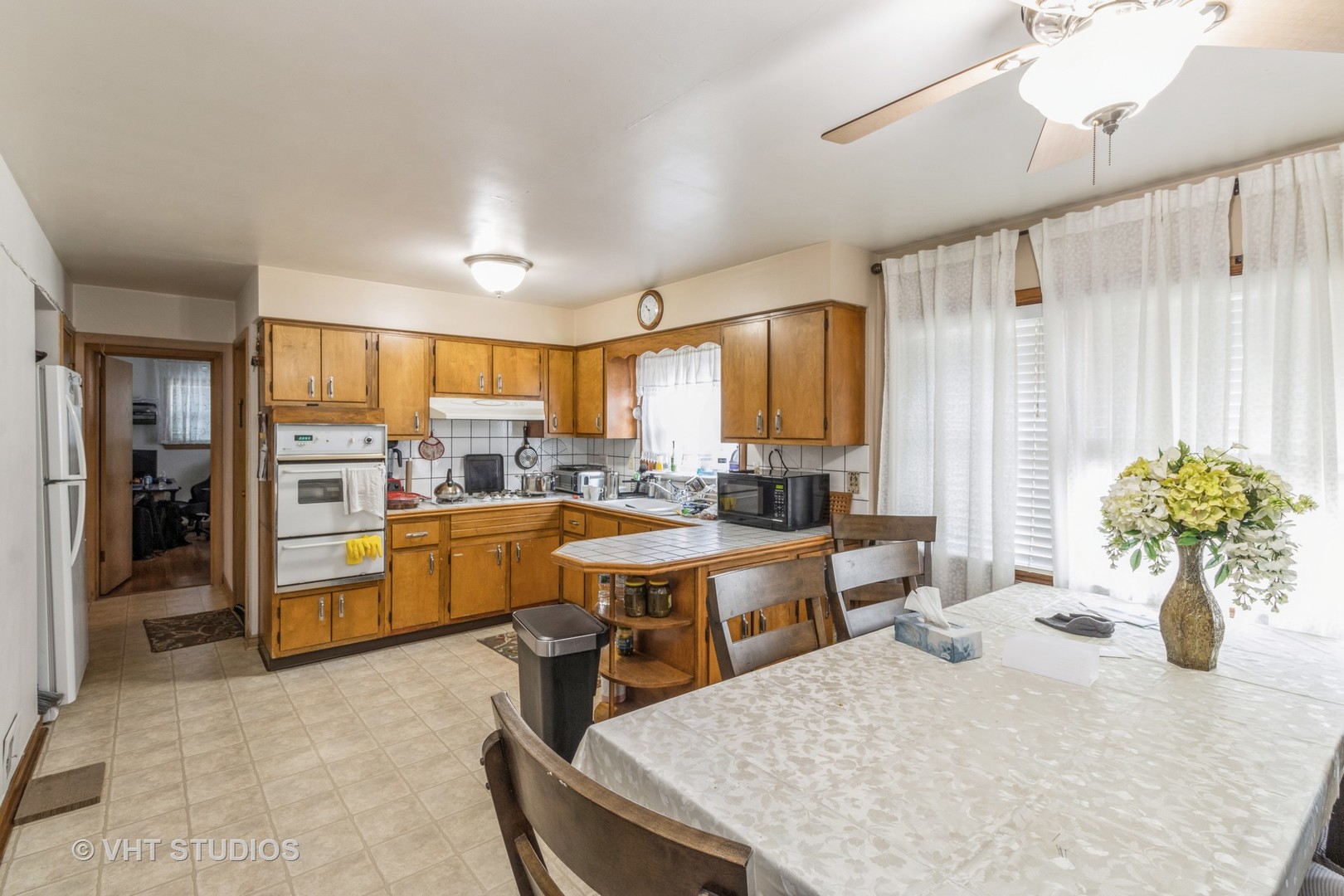 8517 West Foster Avenue Chicago, IL 60656 - Photo 10 of 21 a view of a kitchen and dining room