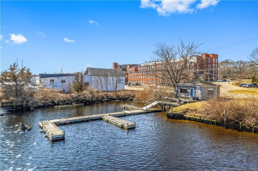 1 River Road Stonington, CT 06379 - Photo 1 of 1 a view of a lake with houses