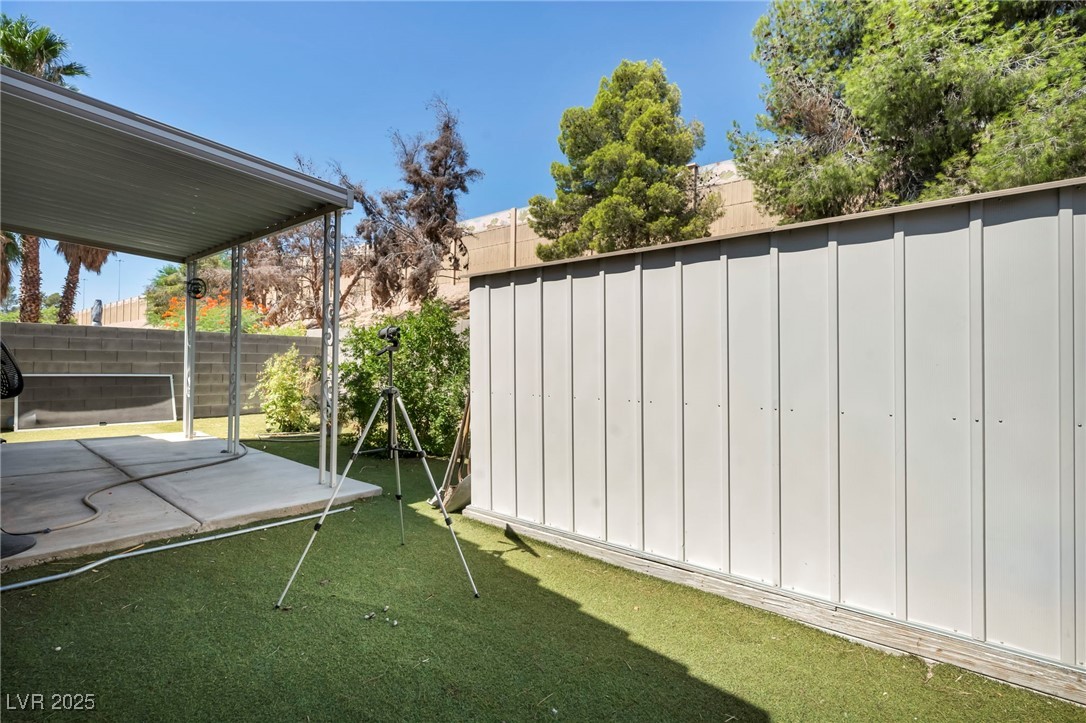 2165 St Paul Way Las Vegas, NV 89104 - Photo 35 of 45 Fenced backyard featuring a patio
