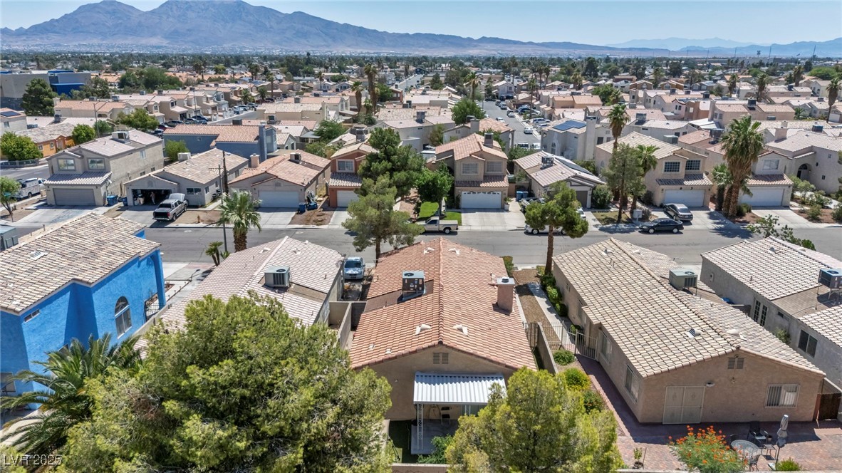 2165 St Paul Way Las Vegas, NV 89104 - Photo 40 of 45 Aerial perspective of suburban area featuring a mountain backdrop