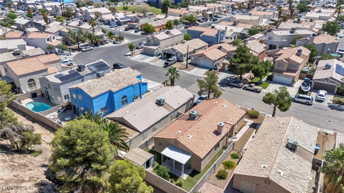 2165 St Paul Way Las Vegas, NV 89104 - Photo 41 of 45 Aerial perspective of suburban area with a pool