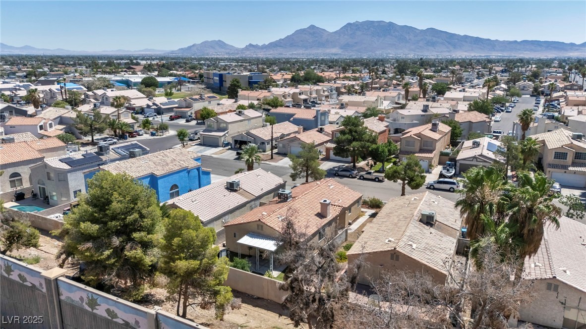2165 St Paul Way Las Vegas, NV 89104 - Photo 42 of 45 Aerial perspective of suburban area featuring a mountain backdrop