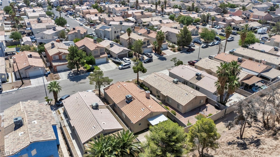 2165 St Paul Way Las Vegas, NV 89104 - Photo 43 of 45 Aerial view of property and surrounding area featuring nearby suburban area