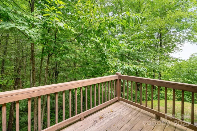 a view of a glass door and the balcony
