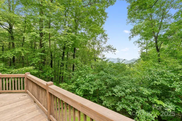 a view of a porch with wooden floor
