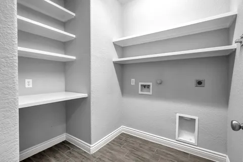 a view of an empty walk in closet