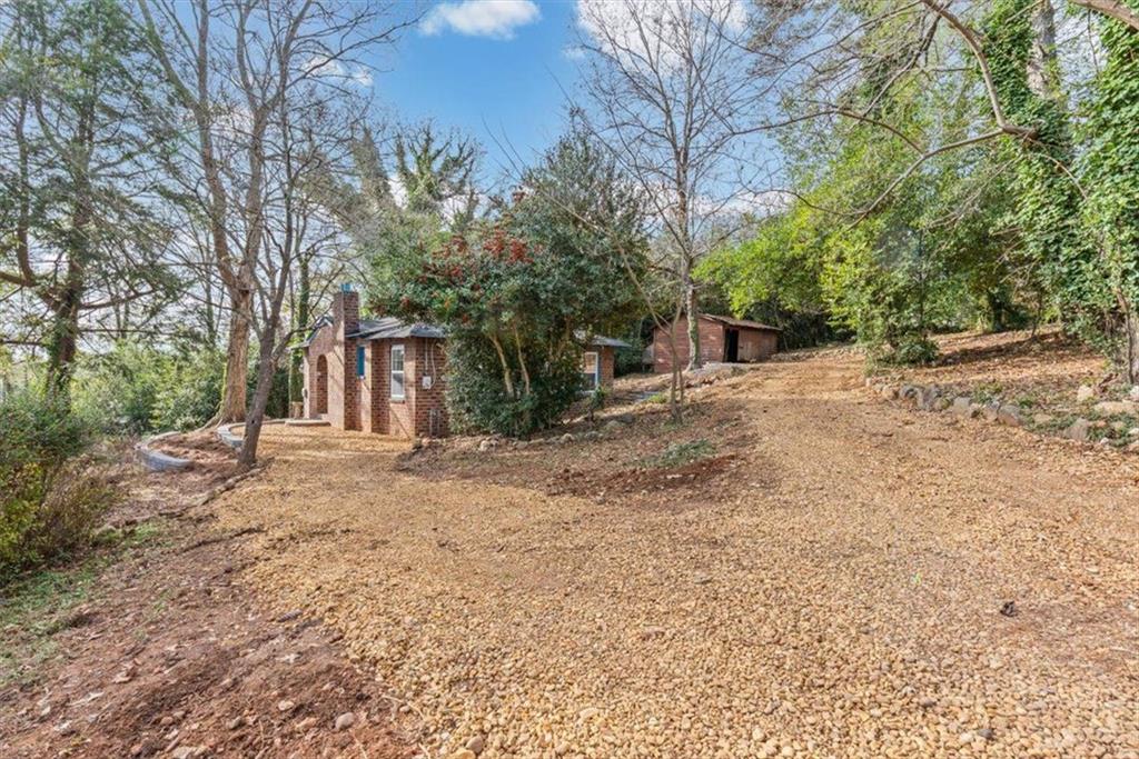 203 Church Street Northeast Rome, GA 30161 - Photo 2 of 36 a view of a yard with a tree