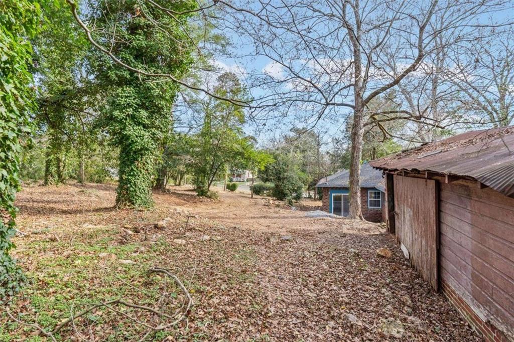203 Church Street Northeast Rome, GA 30161 - Photo 29 of 36 a house with trees in front of it
