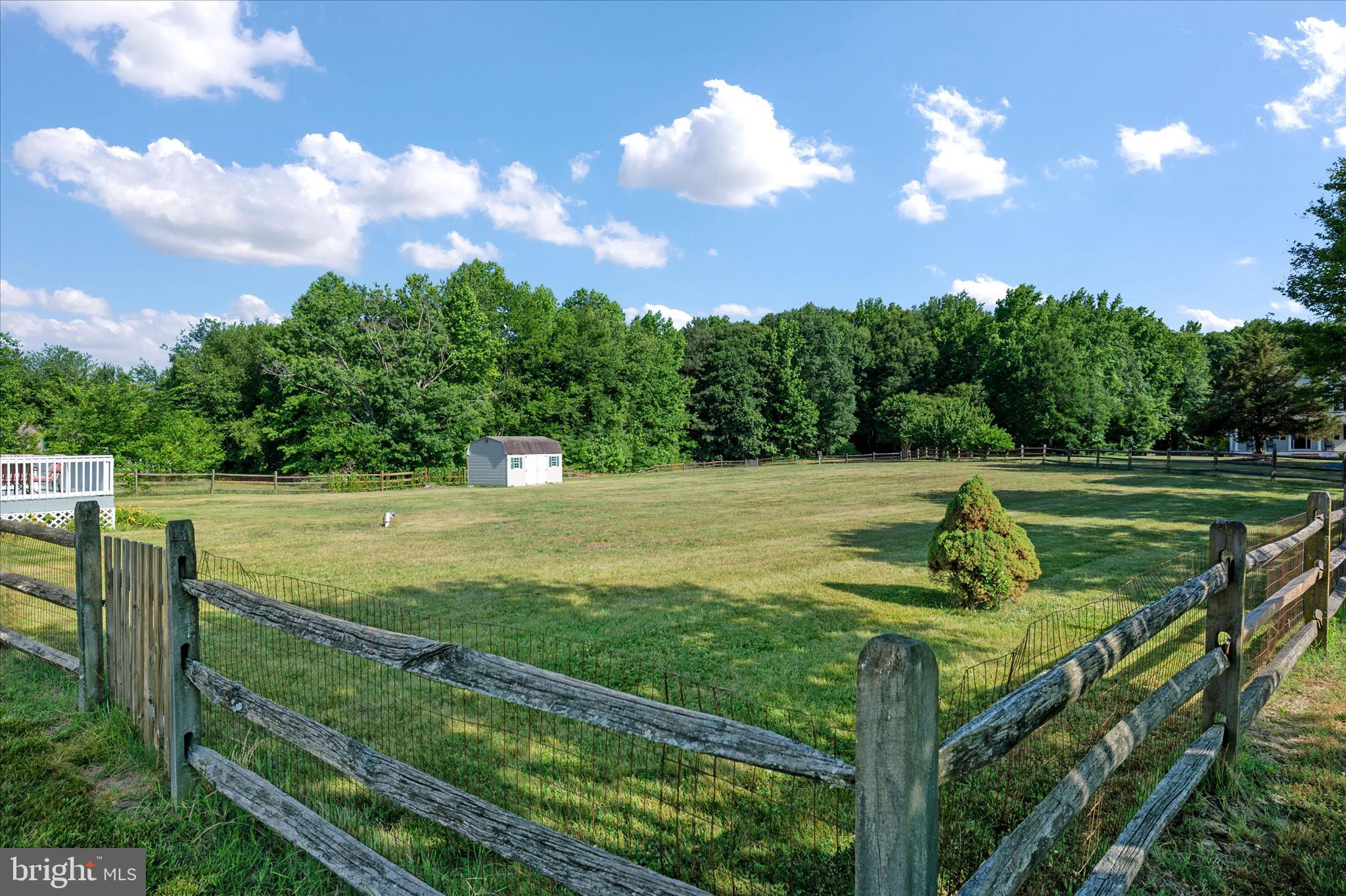 913 Clark Corner Road Centreville, MD 21617 - Photo 41 of 66 a view of a golf course with a lake