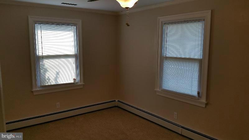 4807 Woods Wharf Road Shady Side, MD 20764 - Photo 8 of 12 a view of an empty room with a window