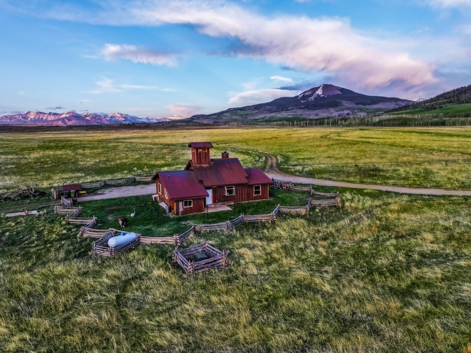 8325 County Rd M44 Placerville, CO 81430 - Photo 12 of 62 a view of a lake with a mountain in the background