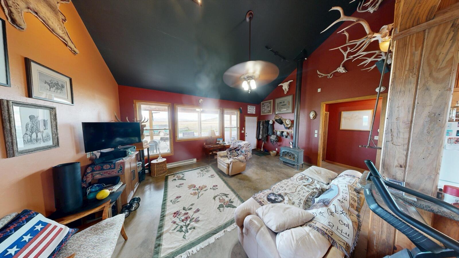 8325 County Rd M44 Placerville, CO 81430 - Photo 38 of 62 a bedroom with furniture and a flat screen tv