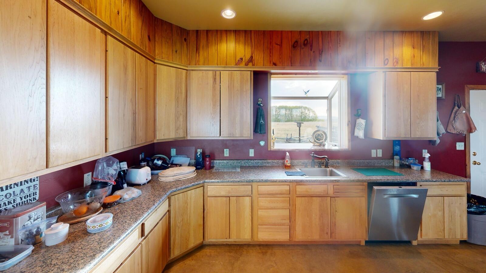 8325 County Rd M44 Placerville, CO 81430 - Photo 39 of 62 a kitchen with sink cabinets and window
