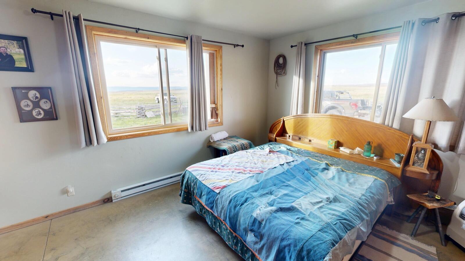 8325 County Rd M44 Placerville, CO 81430 - Photo 42 of 62 a bedroom with a bed and a window