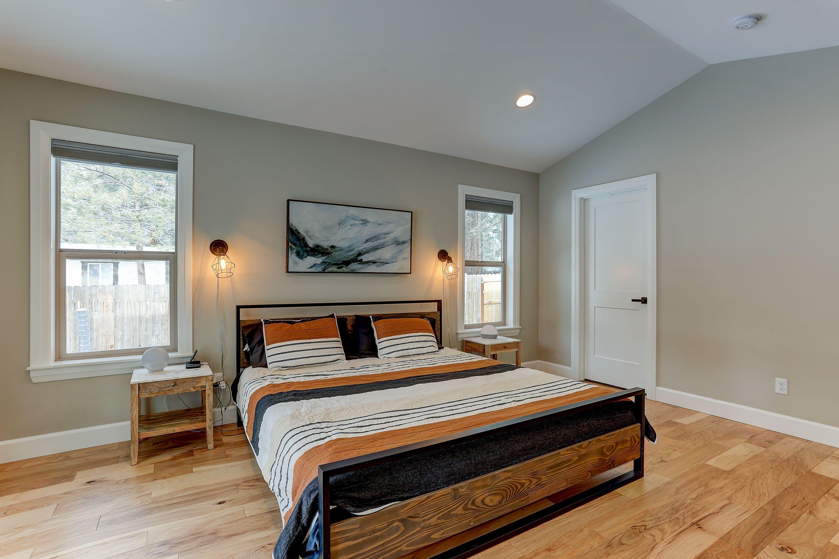 19047 Pumice Butte Road Bend, OR 97702 - Photo 30 of 38 a bedroom with a bed and a window