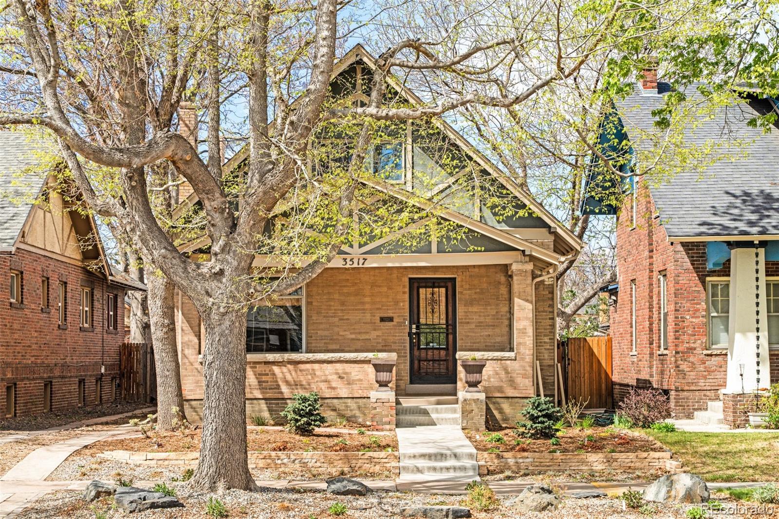 3517 York Street Denver, CO 80205 - Photo 2 of 45 a front view of a house with a yard