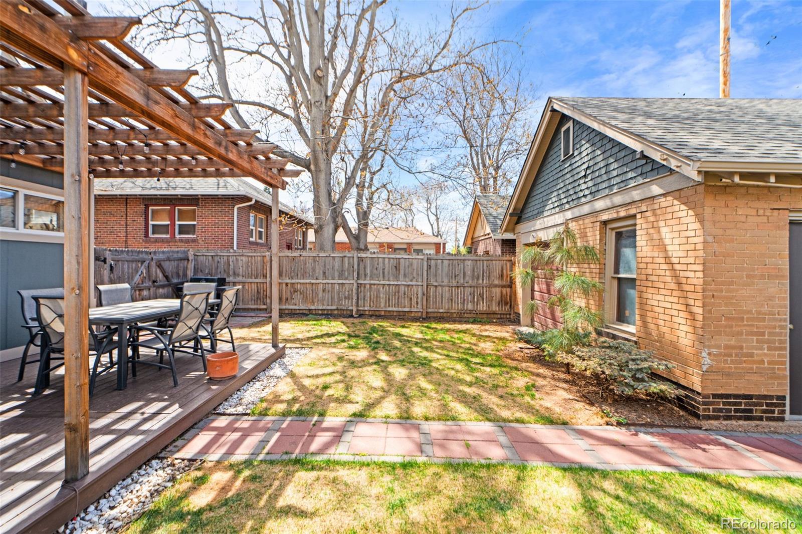 3517 York Street Denver, CO 80205 - Photo 42 of 45 a view of a house with backyard and sitting area