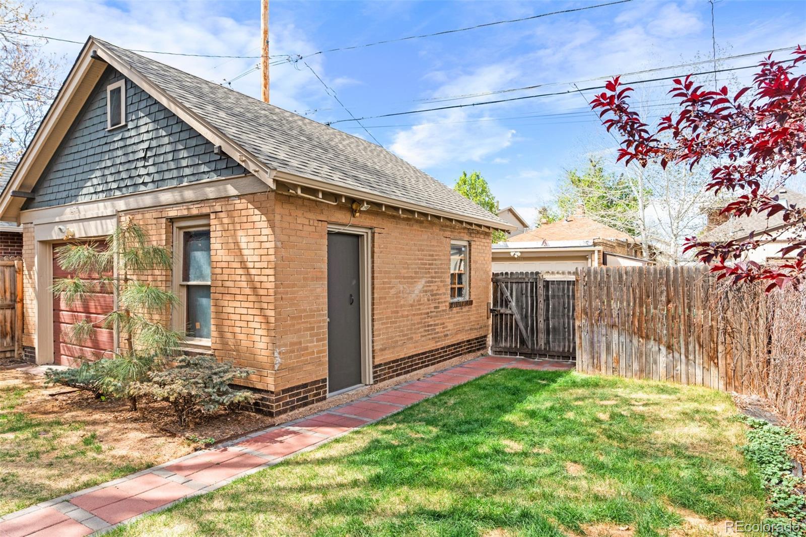 3517 York Street Denver, CO 80205 - Photo 43 of 45 a view of a house with a yard