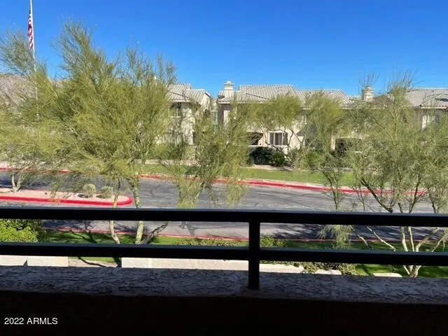 a view of a street from a balcony