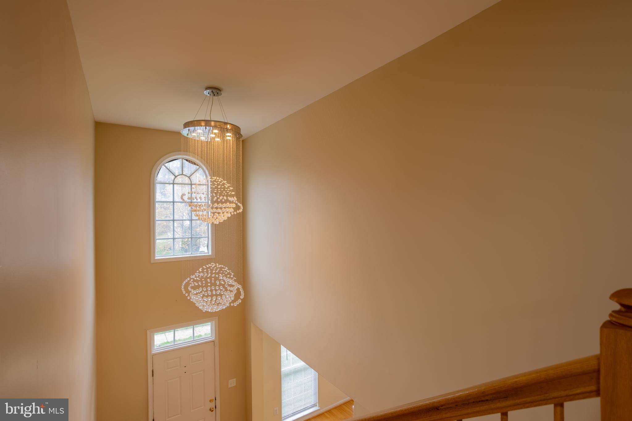 7740 Rotherham Drive Hanover, MD 21076 - Photo 26 of 62 a view of a hallway with windows