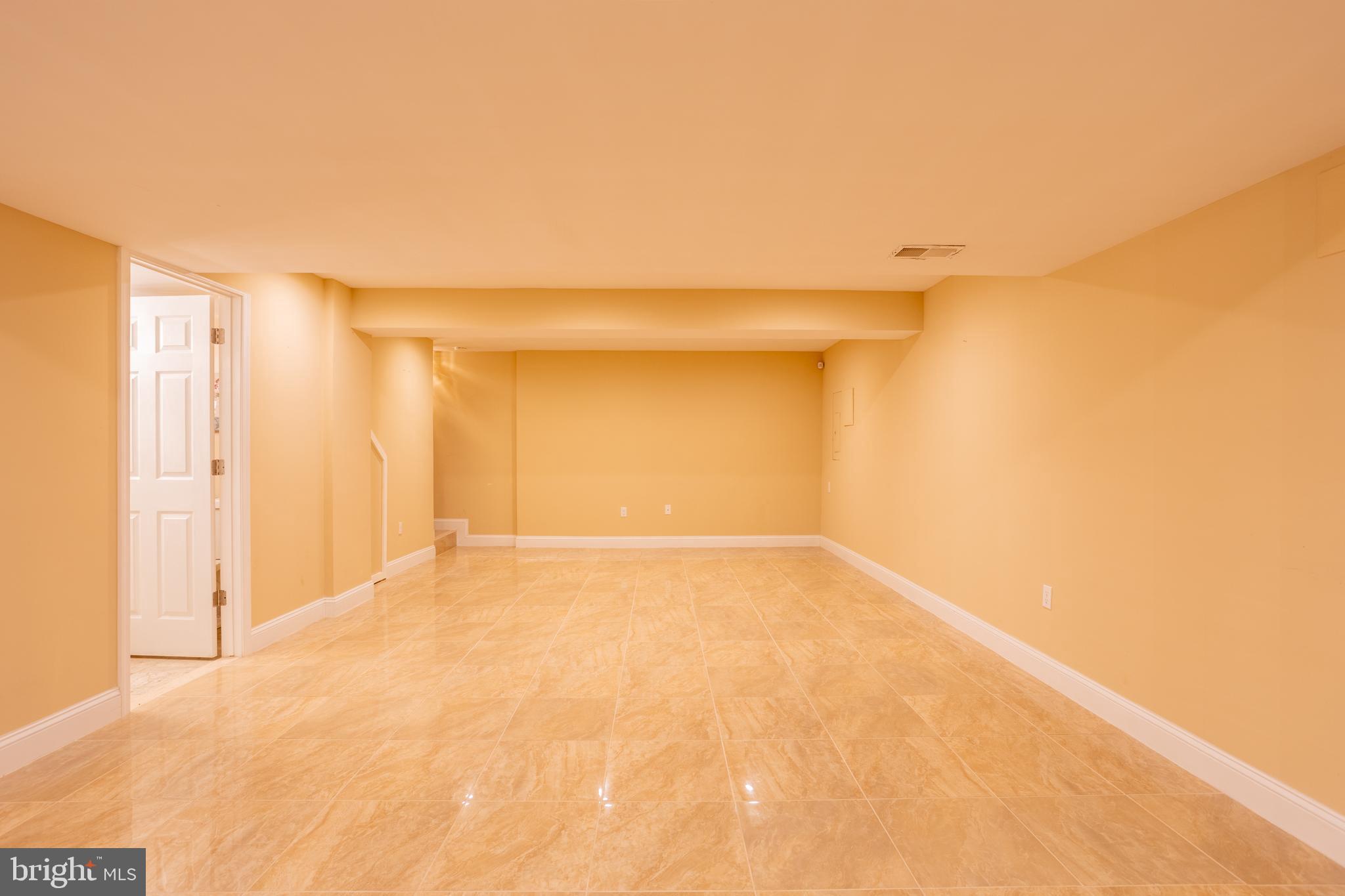 7740 Rotherham Drive Hanover, MD 21076 - Photo 44 of 62 Basement/Entertainment area
