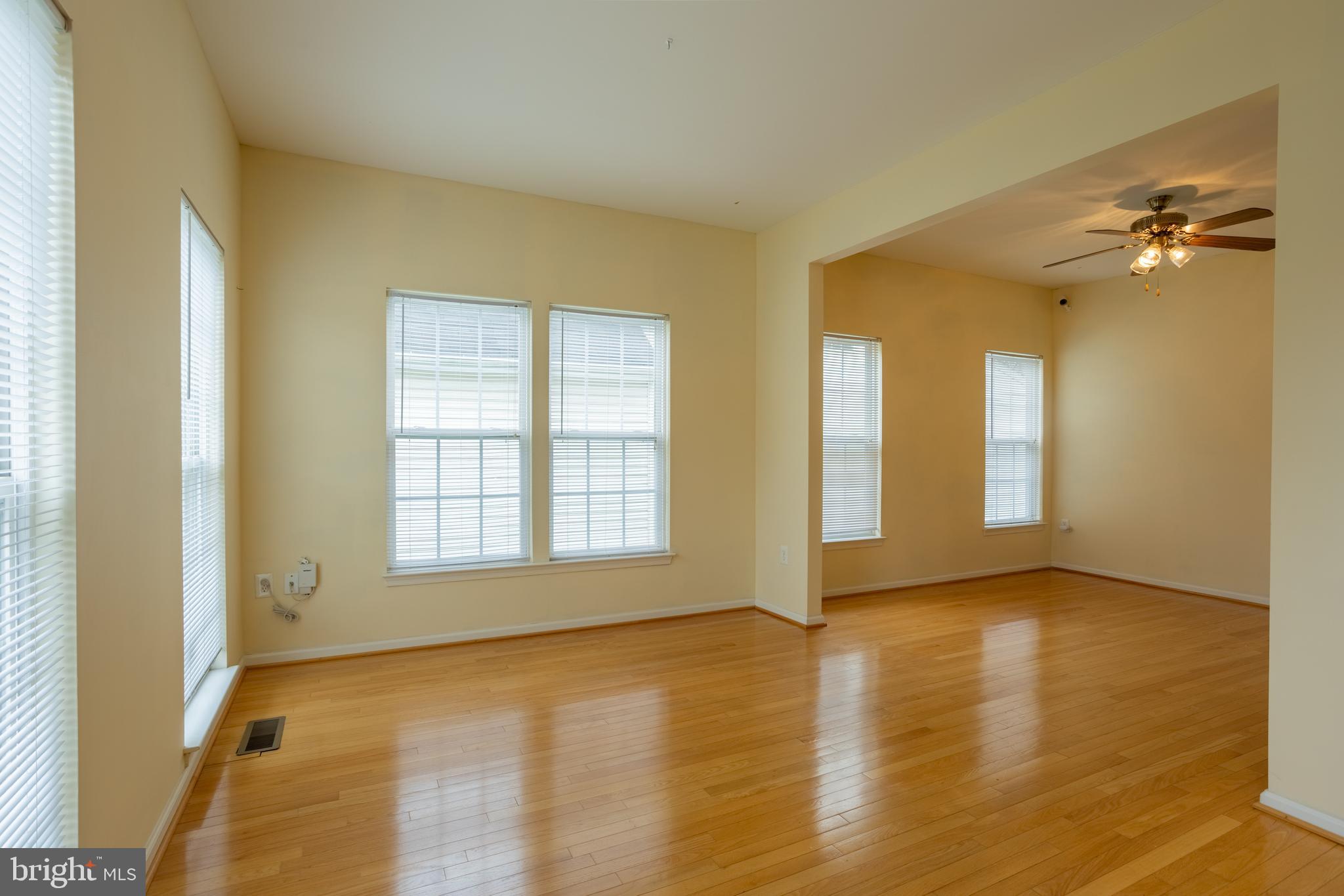 7740 Rotherham Drive Hanover, MD 21076 - Photo 9 of 62 a view of an empty room with glass door